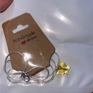 Metallic yellow butterfly necklace